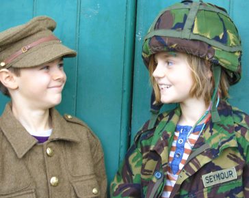 two Boys dressed in soldier uniform