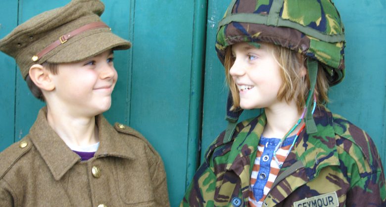 two Boys dressed in soldier uniform